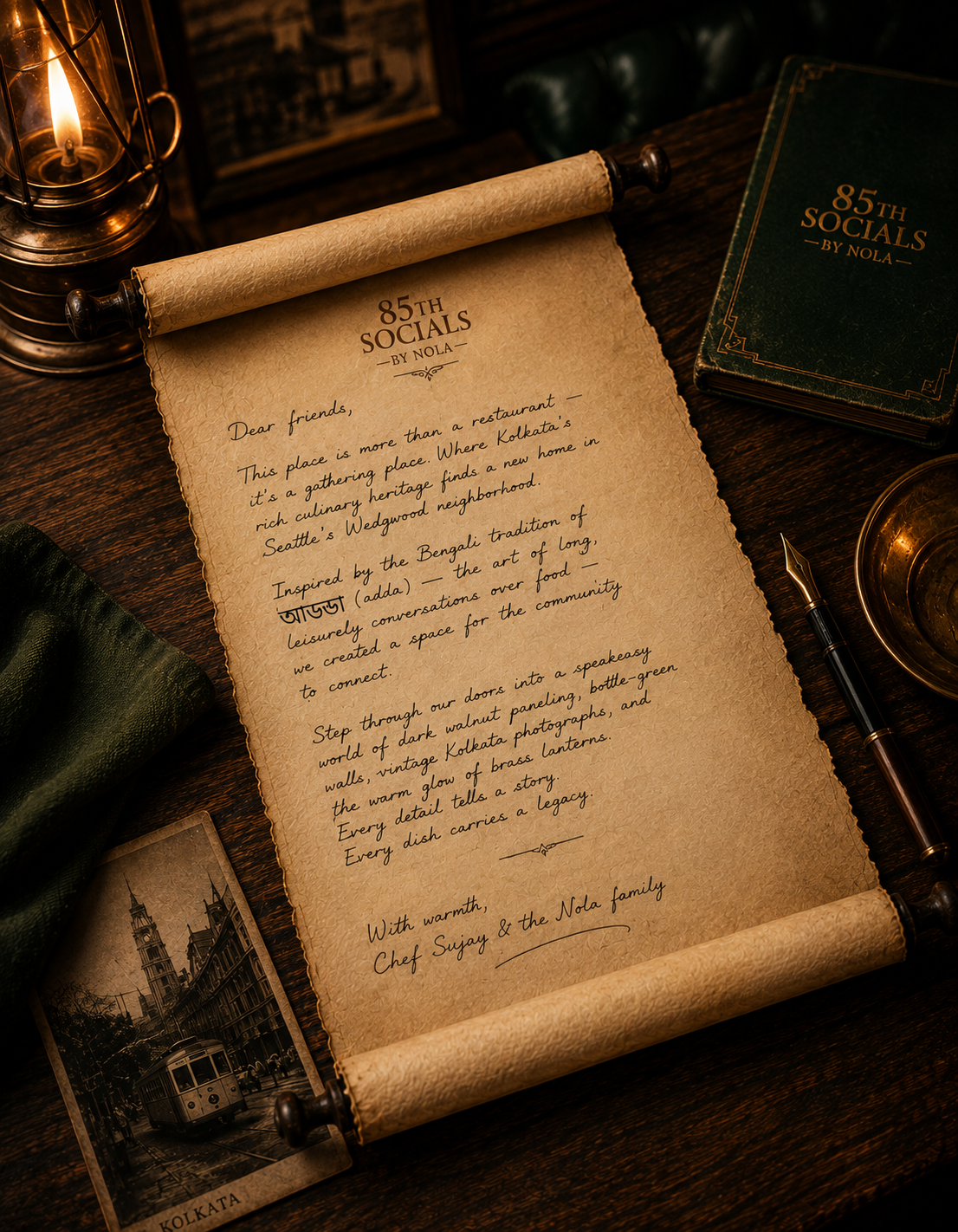 A handwritten scroll letter from Chef Sujay and the Nola family welcoming guests to 85th Socials